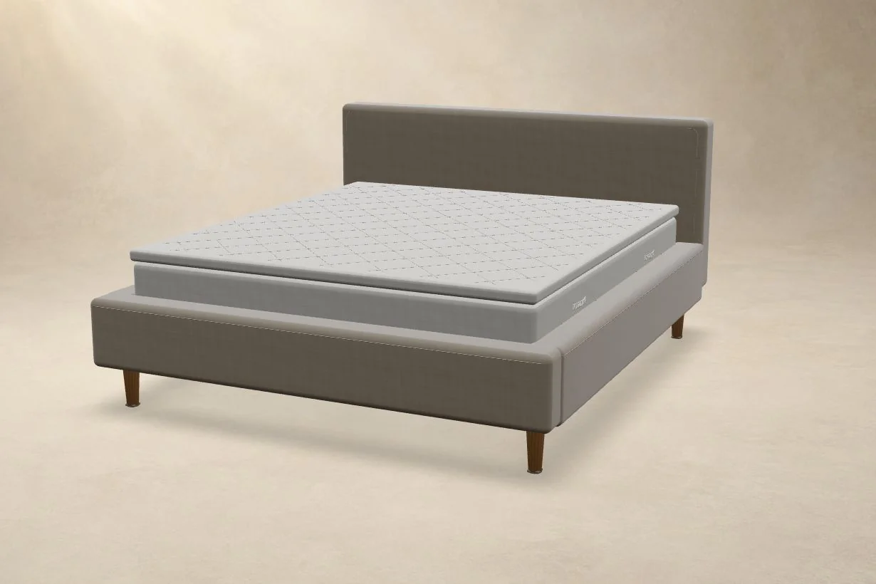 Beige upholstered bed showing its fabric headboard and frame